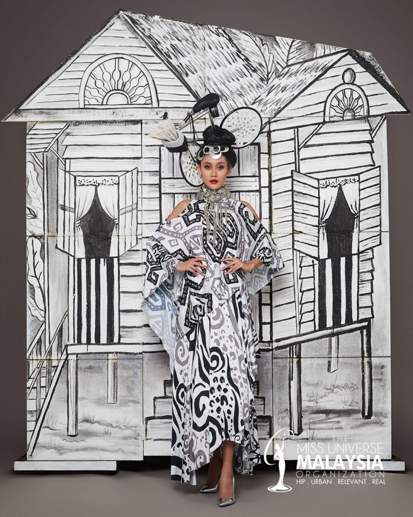 Francisca Luhong James unveiling the black-and-white side of her national costume. Photo: Miss Universe Malaysia/Facebook