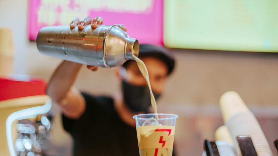 A barista prepares a drink. Photo: Flash Coffee