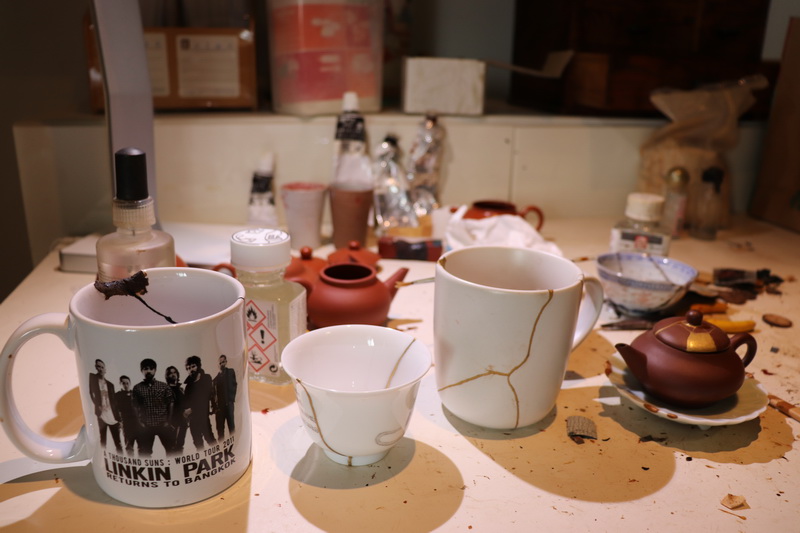 Some mugs, cups and teapots Chayanan was working on. Photo: Coconuts