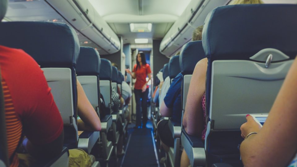 Passengers on a plane. Photo: Unsplash