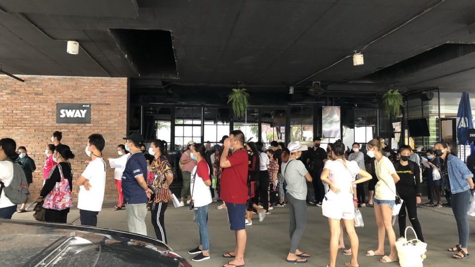 People wait to get their noses swabbed at Arena 10 in Thonglor on early Thursday afternoon. Photo: Coconuts