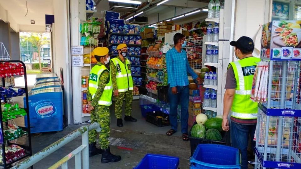 RELA members patrolling the Putrajaya neighbourhood in a photo taken in April, 2020. Photo: RELA WP KUALA LUMPUR/Twitter