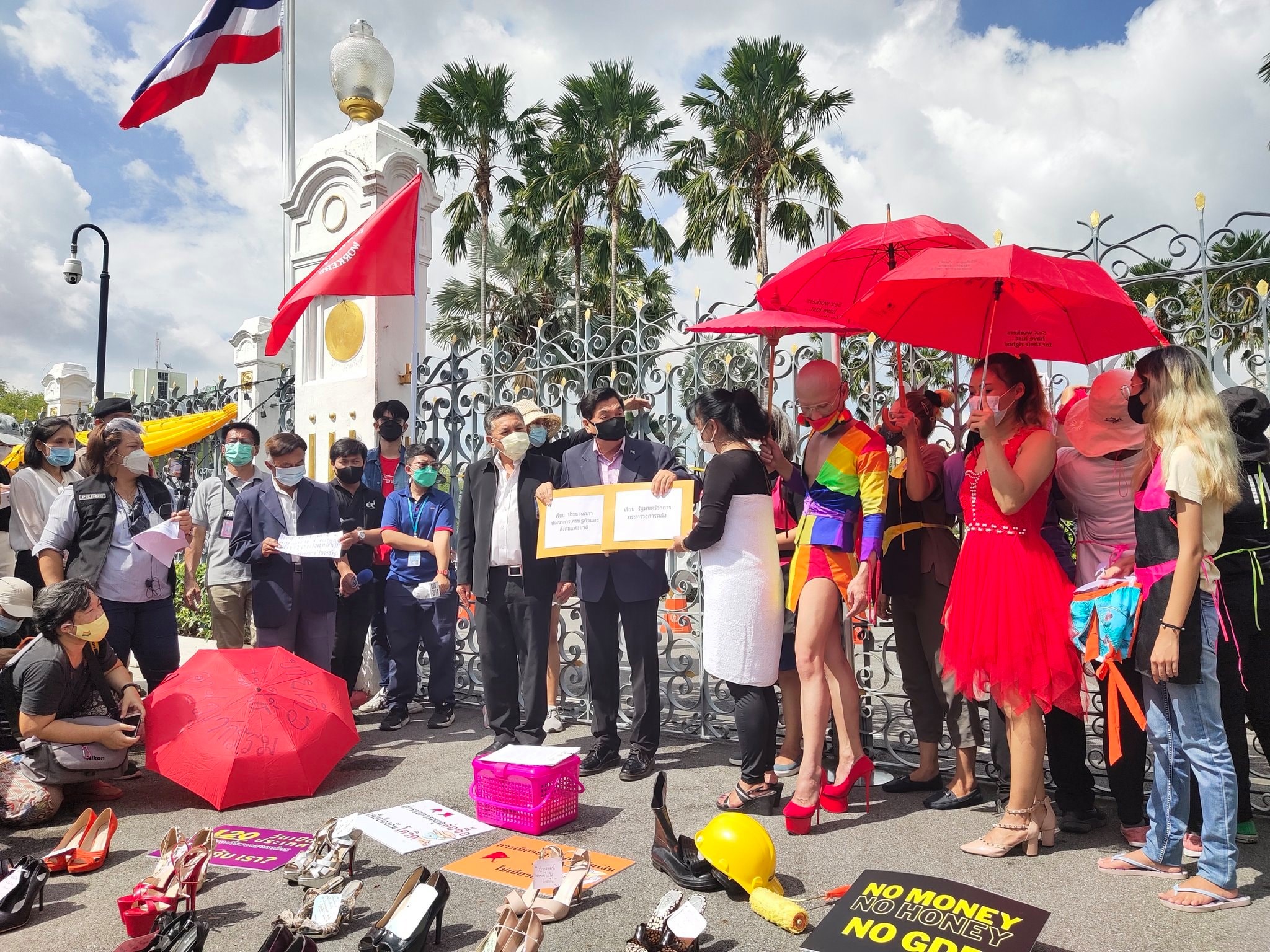 A group of activists, sex workers lay high heels and file petition to government’s officials on Tuesday morning at the Government House. Photo: Ratsadon News / Facebook