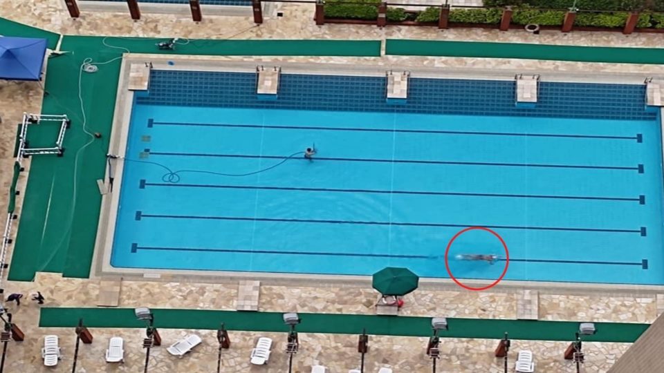 A lifeguard was seen swimming while on duty at Galaxia, a private residential estate, in Wong Tai Sin. Photo: Facebook/Mandy Tam
