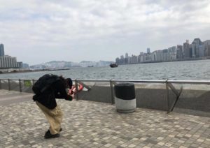 Though embarrassed from the stares he gets in public, Louis seizes every opportunity to bend down for a perfect shot of a never-before-seen rubbish bin. Photo: Louis Chung