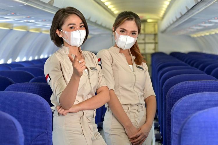 Super Air Jet flight attendants wearing their khaki overalls uniform. Photo: Super Air Jet