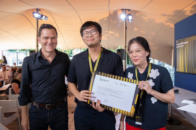 Ratchapoom Boonbunchachoke, at center, and Cattleya Paosrijaroen, at right, at the Locarno Film Festival’s Open Door award ceremony. Photo: Massino Pedrazzini / Locarno Film Festival