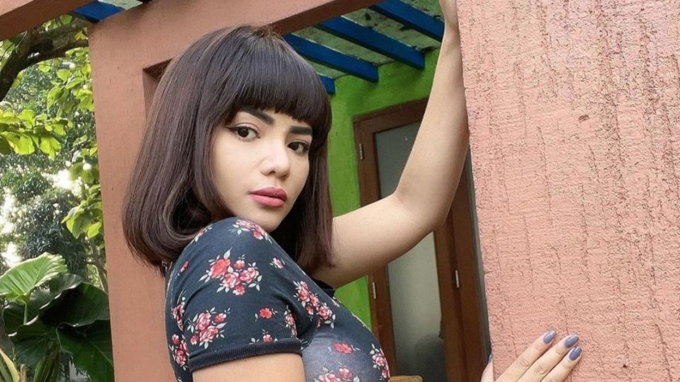 Indonesian DJ Dinar Candy held a one-woman protest on a street in Lebak Bulus, South Jakarta while donning a red two-piece with sunglasses and a face mask. Dinar held a sign that said: “I’m stressed because PPKM was extended.” Photo: Instagram/@dinar_candy