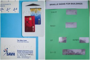 Cards and signs embossed in braille. Photo: Coconuts