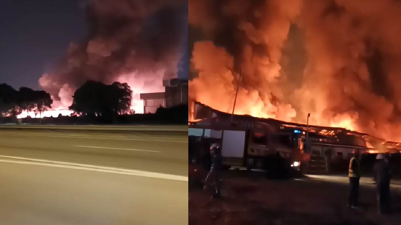 Thick plumes of smoke rising from the massive blaze at a plastic recycling factory in Port Klang on Aug. 11, 2021. Photo: MakkalOsai/Facebook