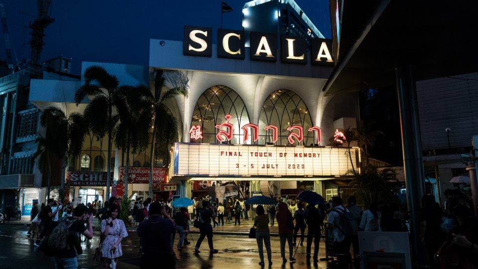 Cinemagoers in front of Scala cinema in early July 2020 during its last week of operation. Photo: Coconuts Bangkok
