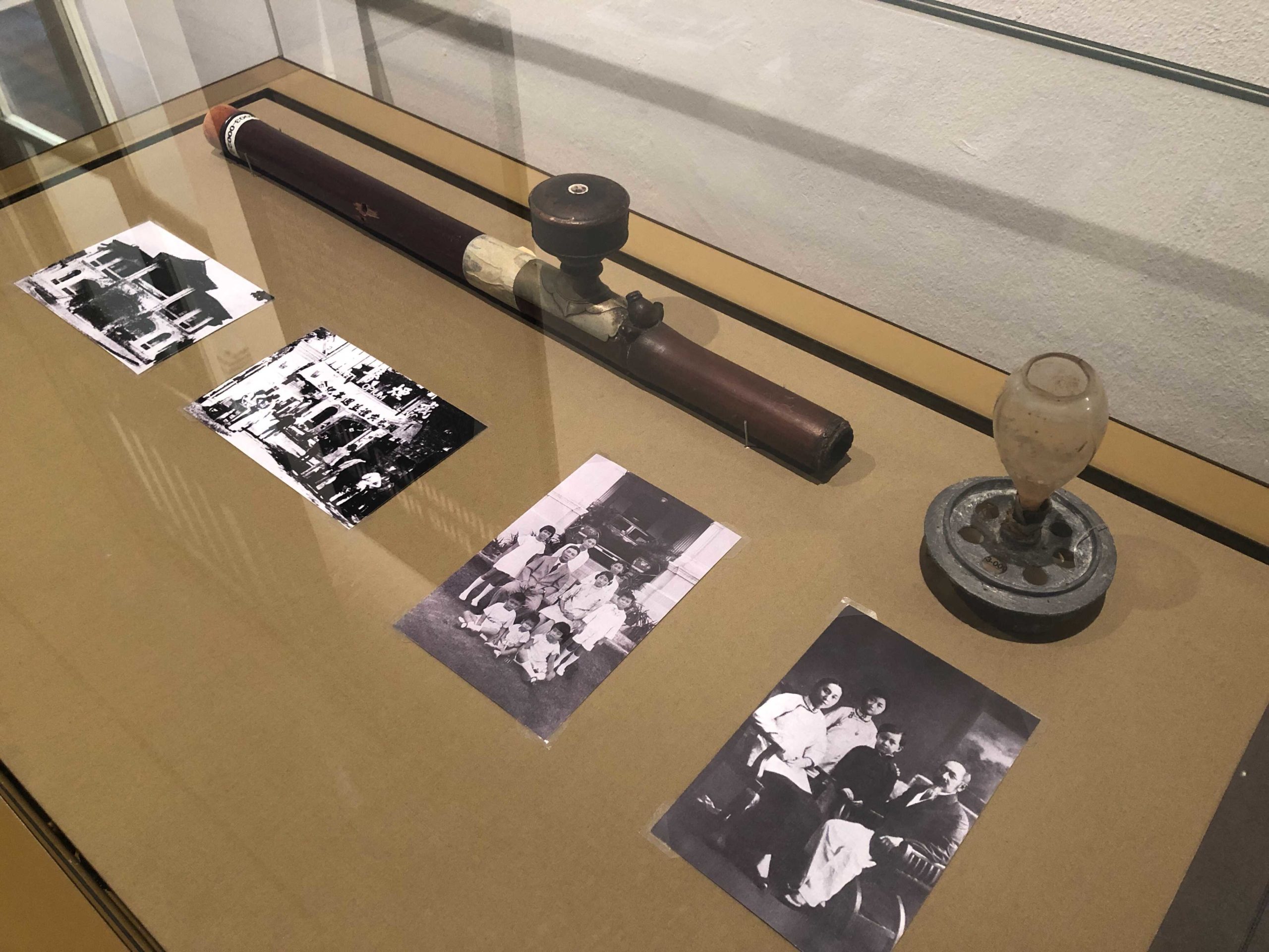 Opium drug paraphernalia and photos of opium clinic owners. Photo: Nurul Azliah/Coconuts