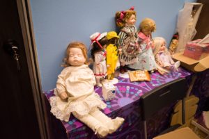 The spirit dolls at the back of the store counter. Photo: Carolyn Teo/Coconuts