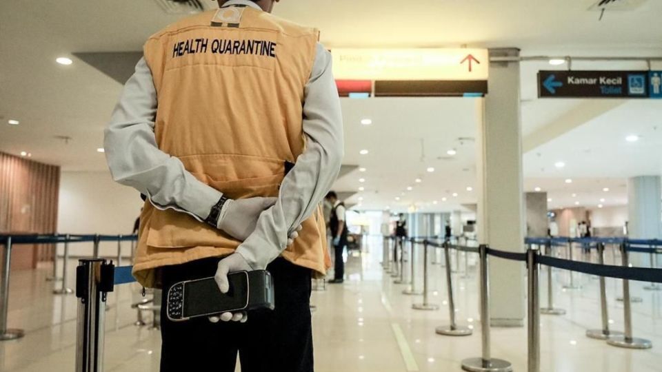 A health officer stationed at the Ngurah Rai International Airport. Photo: Kemenparekraf