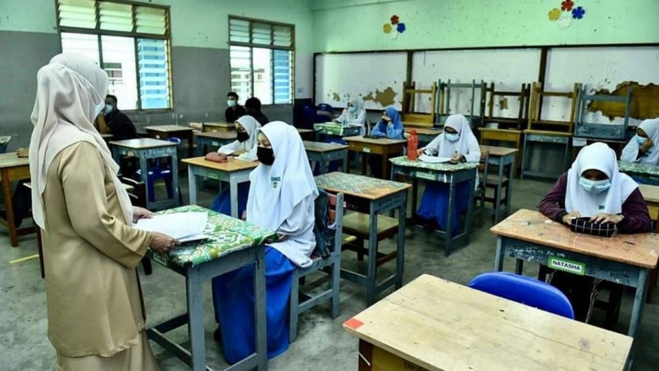 A teacher speaking to her students before an exam. Photo: Ministry of Education
