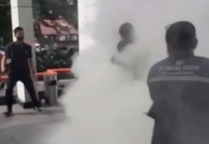 An Afghan refugee set himself on fire in front of the UNHCR office in Medan, North Sumatra on Nov. 30. Photo: Video screengrab