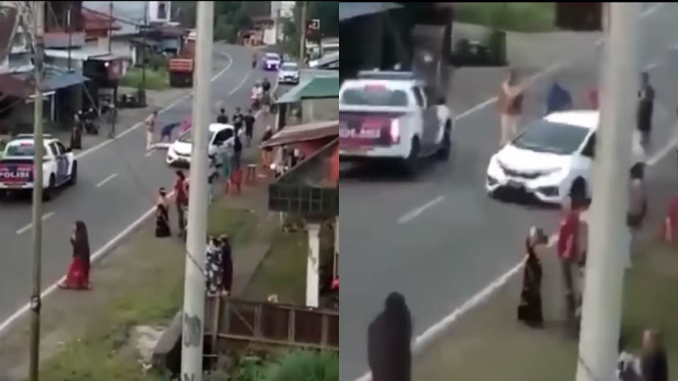 A police officer in South Sulawesi has been demoted from his position after he was caught on film driving past a hit-and-run victim, with the cop now publicly expressing his remorse. Screenshot from video