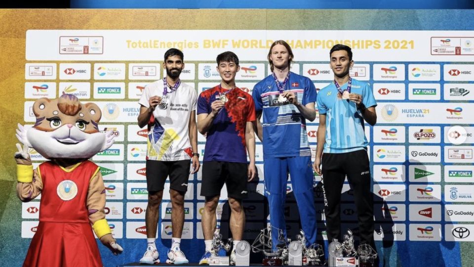 Singaporean badminton player Loh Kean Yew (in red and blue) shares the podium Sunday with three others at the BWF World Championships in Huelva, Spain. Photo: Loh Kean Yew/Instagram