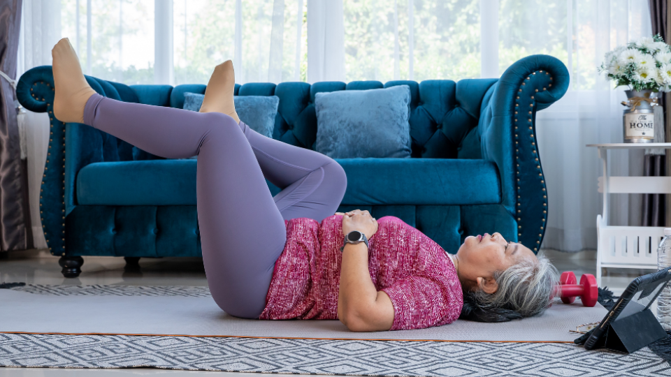 Stretching and performing simple exercises on your own can alleviate your back pain. Photo: KIN TECK TONG