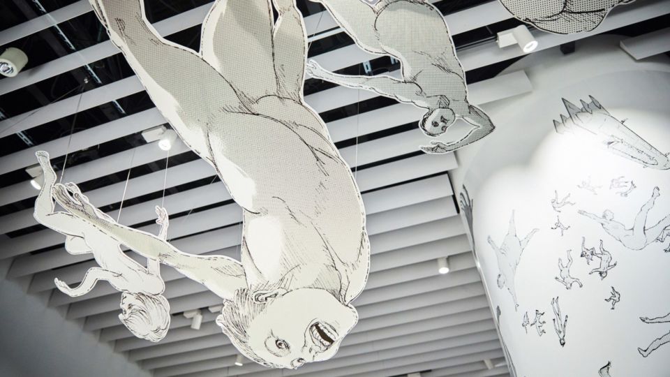 3D titans from the Japanese series falling from the sky. Photo: ArtScience Museum
