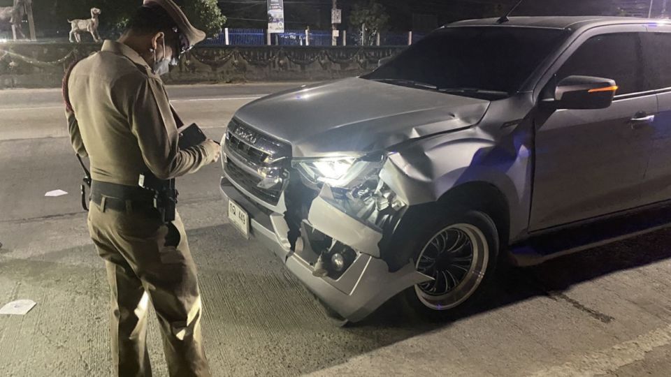 A damaged pickup last night after its driver struck a woman as she crossed a road in southeast metro Bangkok. Photo: Bangkaew district police