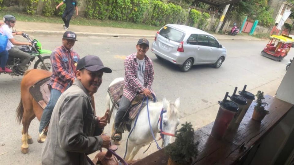 Horsemen in Malaybalay, Bukidnon buy milk tea on horseback amid soaring fuel prices. Photo by Katrina Cudal Hernandez