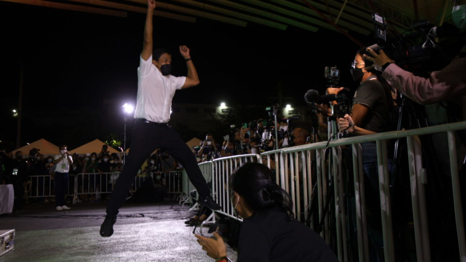 Chadchart Sittipunt jumps before the members of the media Sunday night as the preliminary election results showed him heading toward a landslide win. Photo: Chadchart Sittipunt campaign / Courtesy