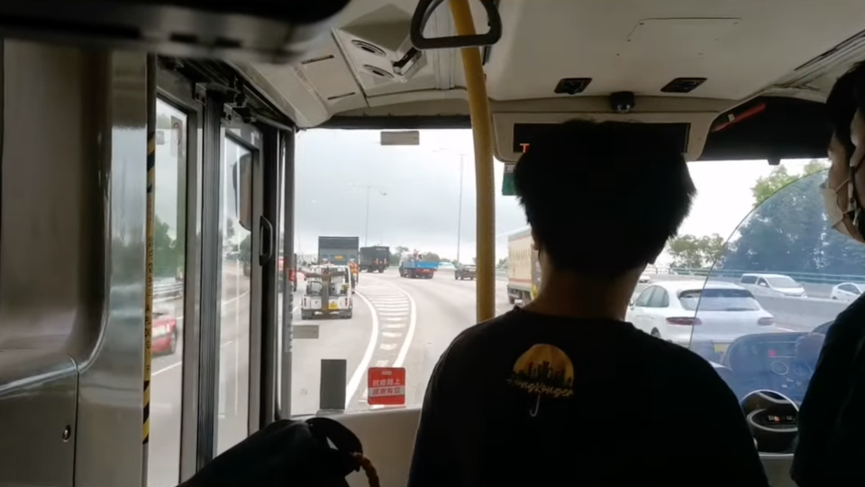 Screengrab of YouTube video showing bus enthusiasts guiding a driver back on track after he made a wrong turn.