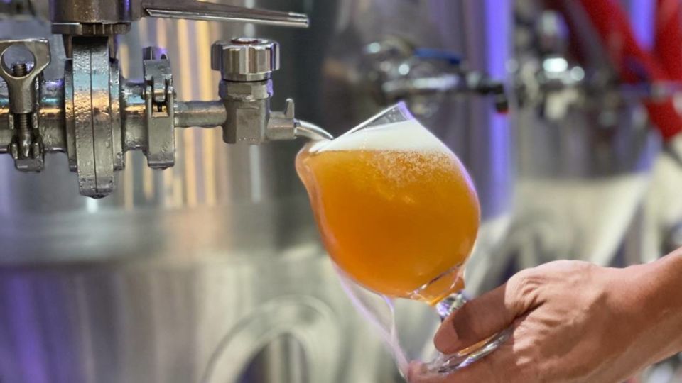 A Helles Lager called Khaosan is being poured into a glass from the beer tank at Bootleg Brothers’ brew pub. Photo: Bootleg Brothers