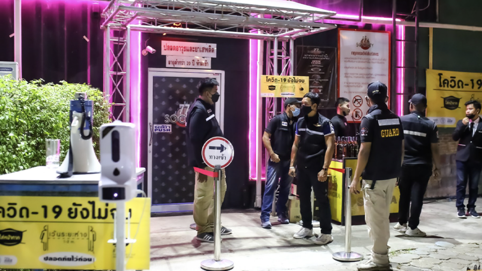 Officers outside the 77society nightclub in Bangkok’s Bang Khun Thian district. Photo: 77society / Facebook