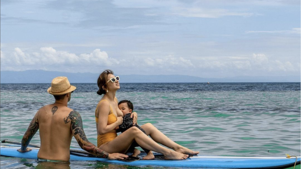 Coleen Garcia breastfeeds son on paddleboard. Image: Coleen Garcia (Instagram)