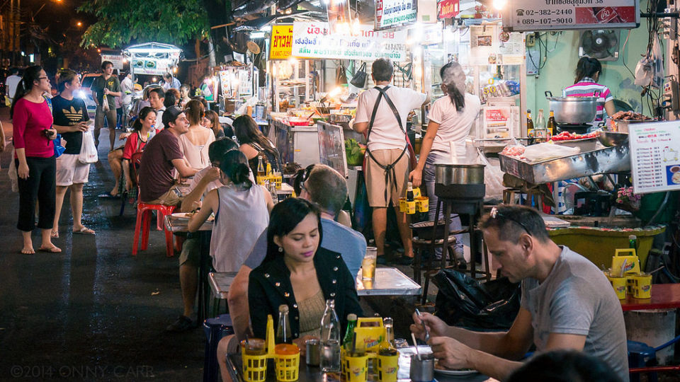 Happy diners, happy vendors line what had been a popular food destination in Soi Sukhumvit 38 colloquially known as “Food Street” before they were evicted. Photo: Killerturnip/Flickr