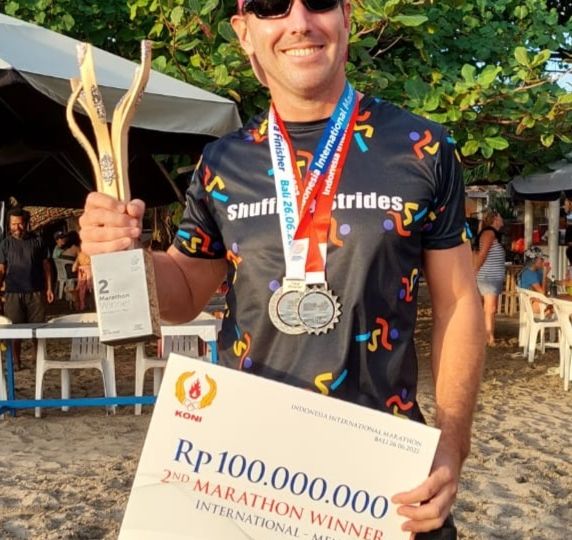 Aussie Mike ‘Akerz’ Akerman, who placed 2nd for the international men’s category at the Indonesia International Marathon (IIM) on June 26, struggled to receive his prize money for months. Photo: Akerman’s lawyer, Frank Hutapea.