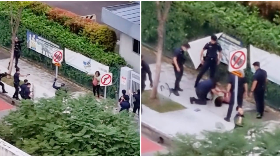 A 53-year-old woman against at least 10 police officers outside St Hilda’s Secondary School in Tampines yesterday. Photos: Miseneri/TikTok
