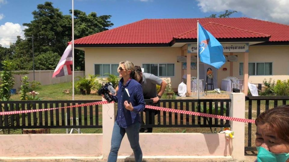 CNN reporters were seen climbing over a fence the exit the cordoned-off crime scene at a child care center in Nong Bua Lamphu’s Uthai Sawan district. An unidentified  Thai reporter provided the image to the Foreign Correspondents’ Club of Thailand.
