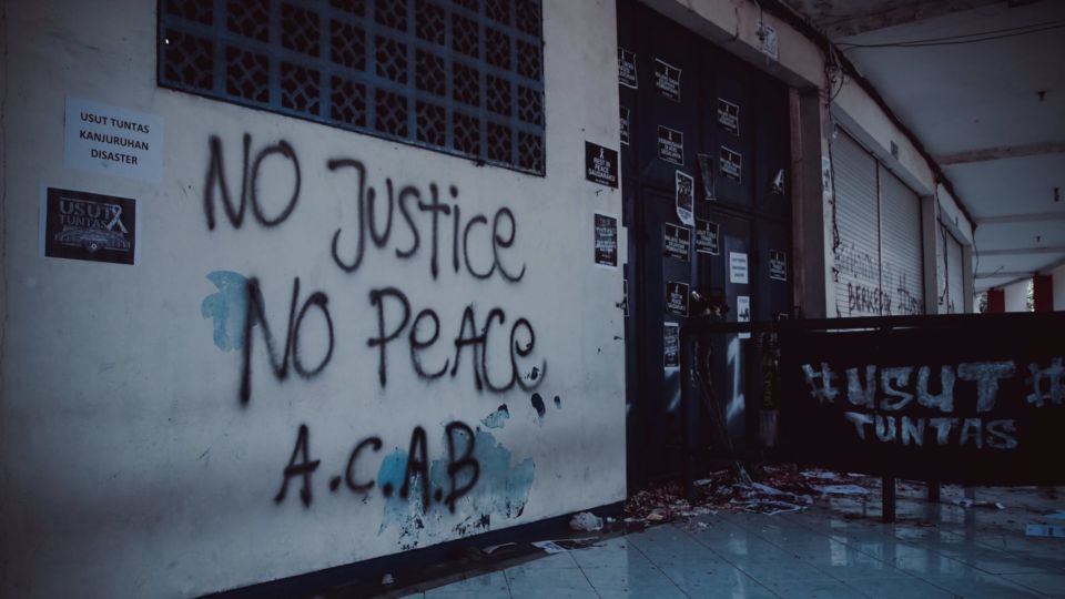 Arema fans tagged Kanjuruhan Stadium with graffiti expressing their displeasure toward authorities. Photo courtesy of Jefry Gigih Permana