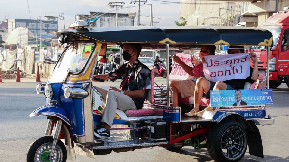 Anti-government protesters from Thalufah on Tuesday staged a protest against prime minister Gen. Prayuth Chan-ocha on a Tuk-Tuk with a banner that reads ‘Prayuth, get out.’ Photo: Thalufah
