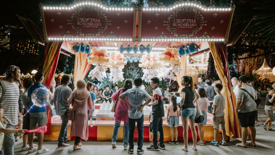 Play carnival games at the Games Village. Photo: Christmas Wonderland at Gardens by the Bay