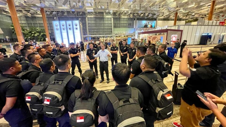 Minister of State for Home Affairs and Minister of State for National Development Muhammad Faishal Ibrahim briefing the SCDF contingent before departure. Photo: SCDF/Facebook
