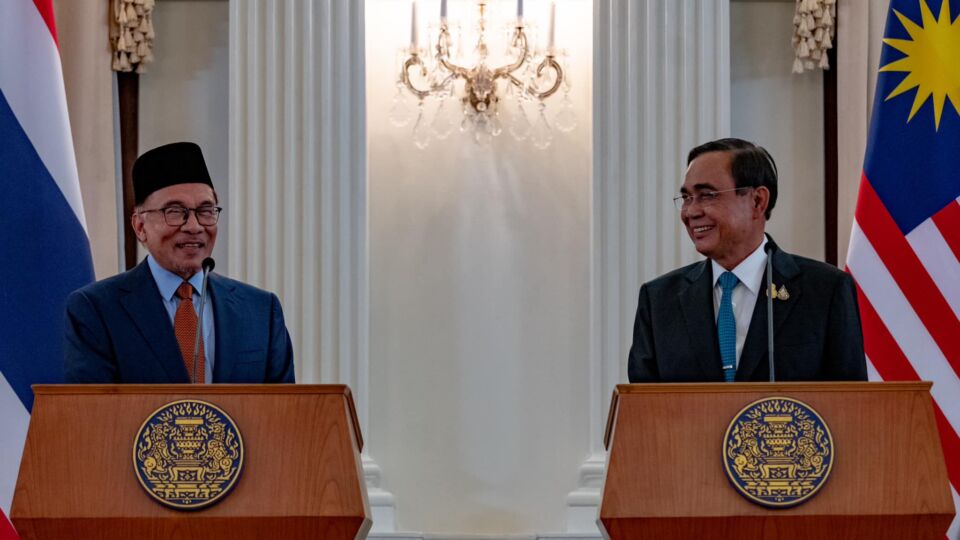 Malaysia’s Anwar Ibrahim (left) with Thai PM Prayut Chan-o-chan during a joint speech in Bangkok. / Anwar Ibrahim Facebook