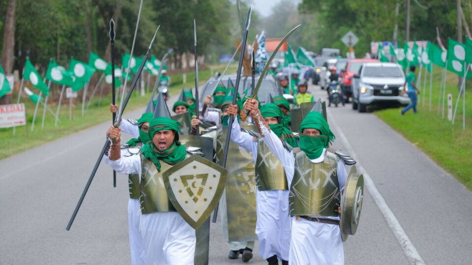 Terengganu PAS Youth members were seen clad in medieval Islamic war costumes and armed with fake swords, spears, and shields at a parade in  the state on Saturday. Photo from PAS Putrajaya Facebook. 