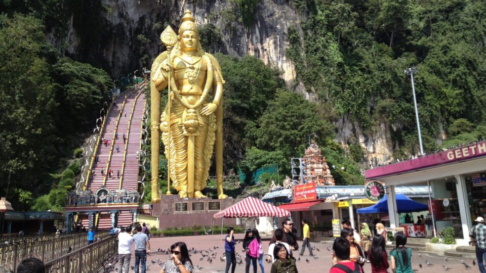 Batu Caves is a limestone hill, which has a series of caves and cave temples, in the Gombak district, 13 kilometres north of Kuala Lumpur, Malaysia. It takes its name from the Sungai Batu or Batu River, which flows past the hill.  The cave is one of the most popular Hindu shrines outside India, dedicated to Lord Murugan.