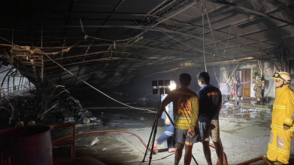 The scorched interior of a garage used to store electric golf carts at the Chulachomklao Royal Military Academy in Nakhon Nayok province. Photo: FM91 Trafficpro