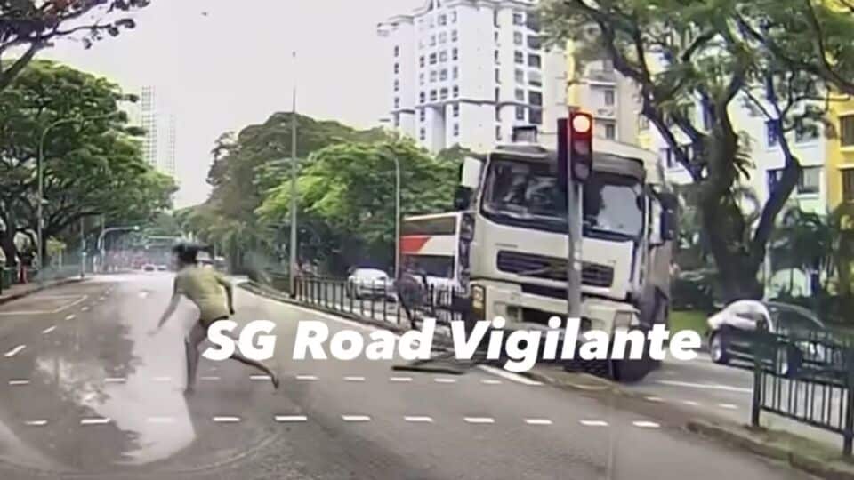 Screenshot from a dashcam footage of a garbage truck crashing into a traffic post along Ganges Avenue yesterday. Photo: SG Road Vigilante/Facebook
