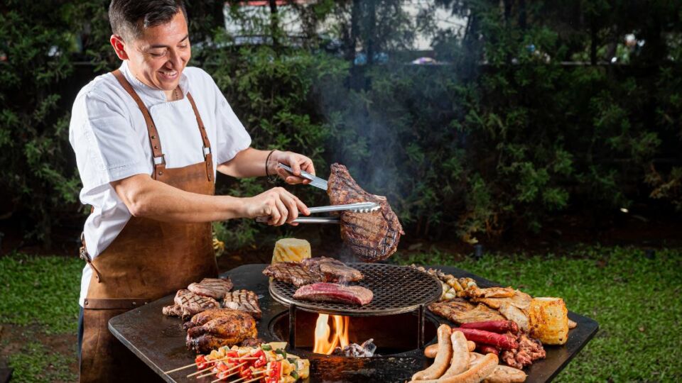 Sudestada Executive Chef Victor Tarboda manning the monolith grill. Photo: Sudestada