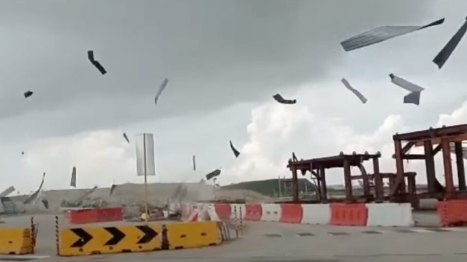 A screengrab from the video showing the landspout at Changi East construction site on Sunday. Photo: Amin Aziz/YouTube
