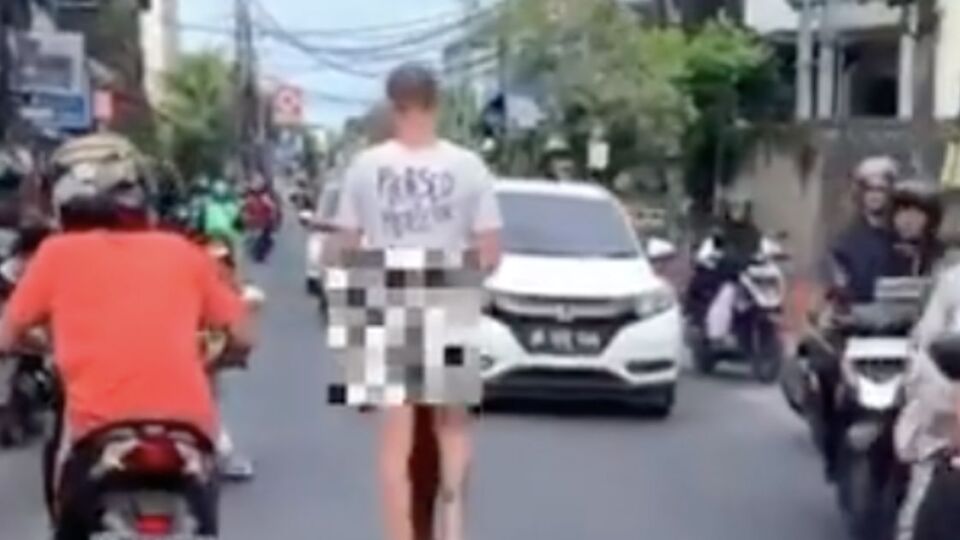 An unidentified foreign male walking in Kerobokan on June 18 with no pants on. Photo: Video screengrab