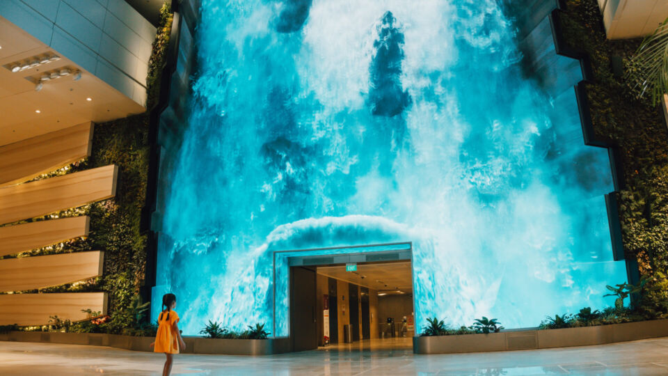 The Wonderfall, a digital waterfall that is the centerpiece of Terminal 2’s Departure hall. Photo: Changi Airport Group