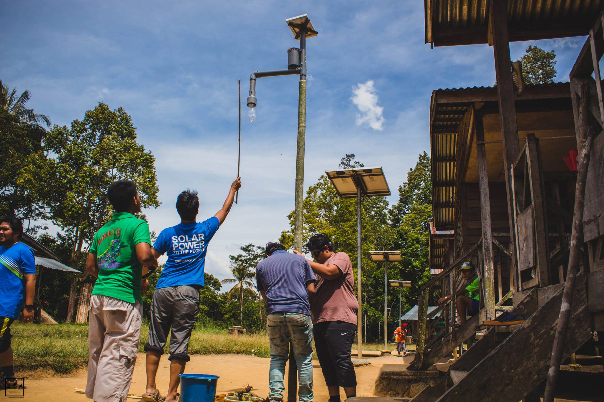 Installation of solar lamps (Photo by Incitement)