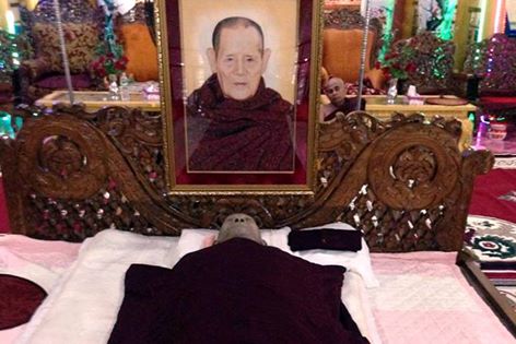 Win Sein Ta Ya lies in state. FREE FUNERAL SERVICES SOCIETY